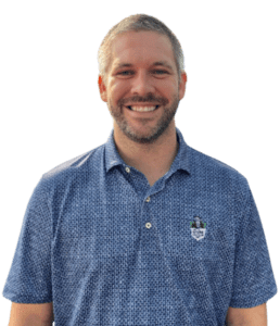 Professional smiling man in blue patterned shirt, isolated on transparent background, suitable for corporate profiles.