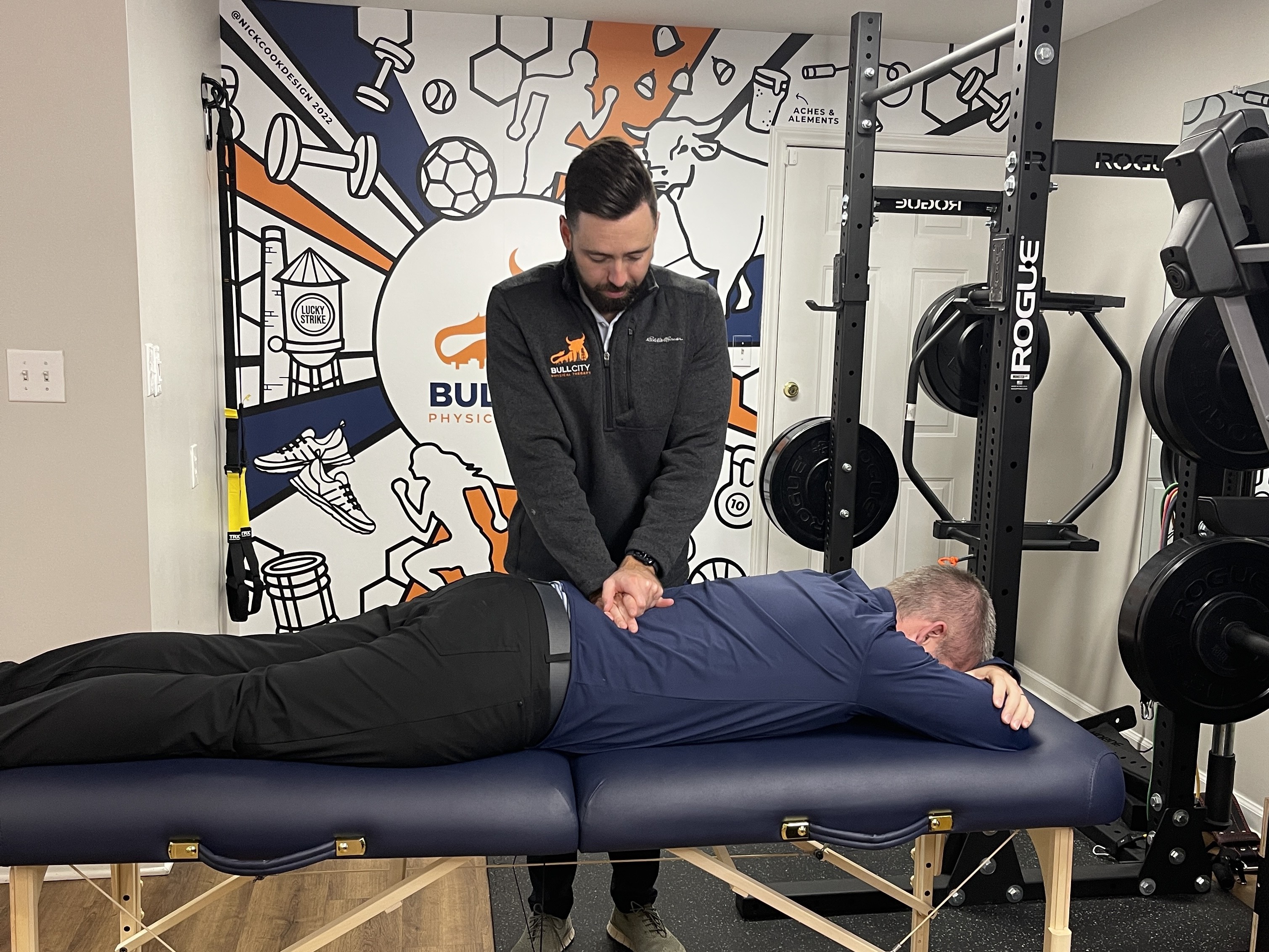 A man getting a massage from a physical therapist