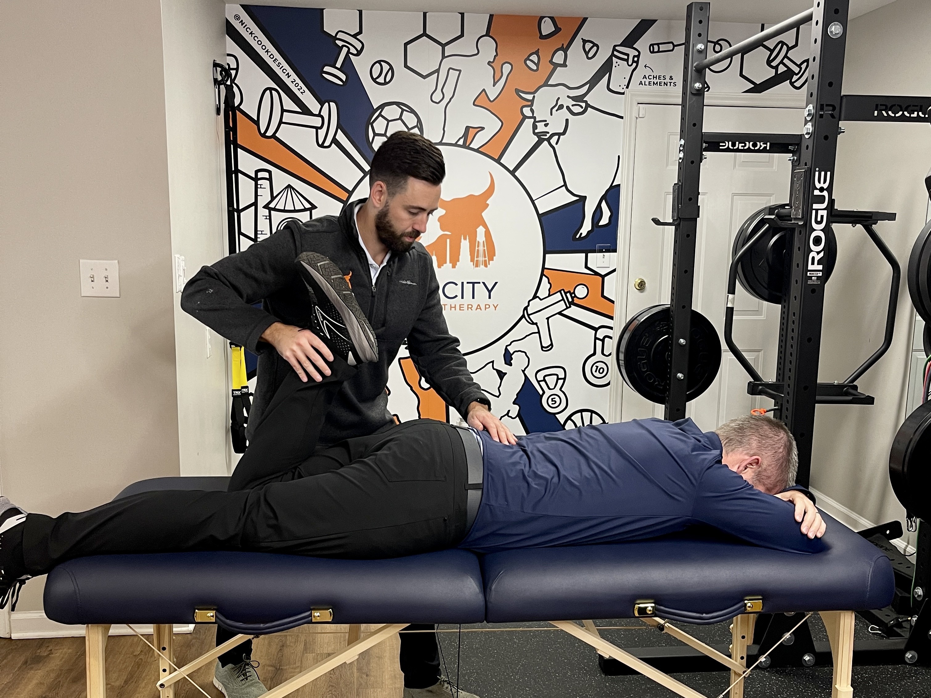 a man getting physical therapy for his back in Charlotte